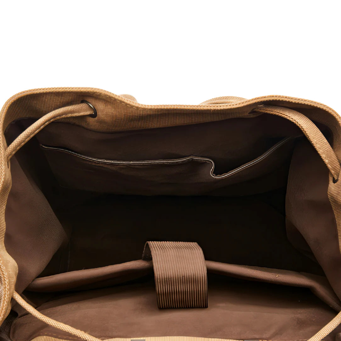 Sac à dos en toile beige avec intérieur marron et sangle côtelée
