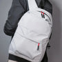 Sac à bandoulière gris clair avec zips rouges et noirs pour Collégien ou Adolescent