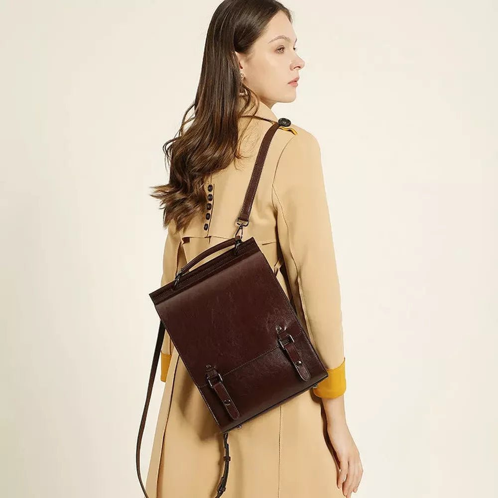 Cartable vintage en cuir en cuir marron foncé avec double boucle et poignée supérieure