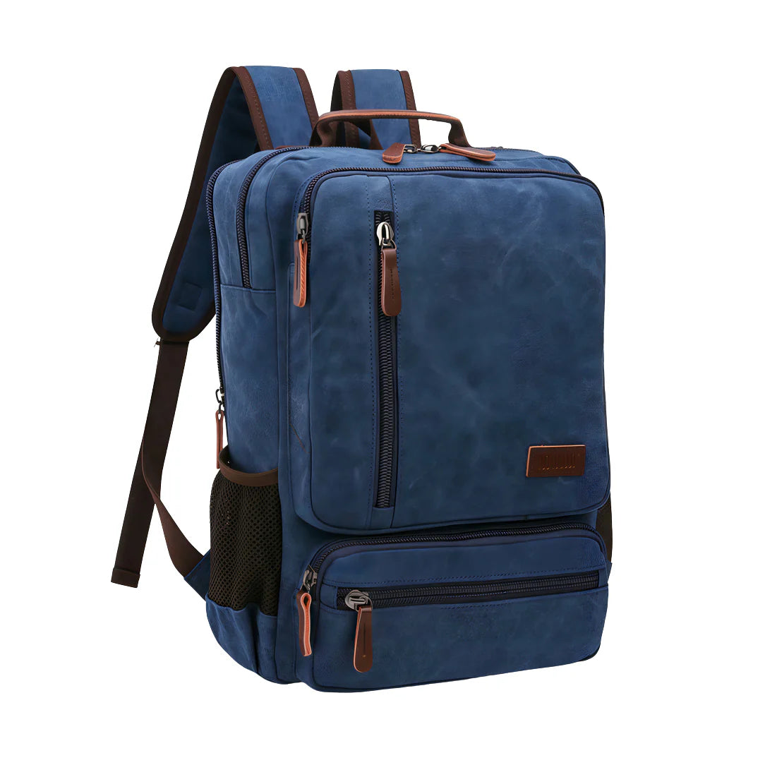 Sac à dos vintage bleu en toile avec accents cuir marron et fermetures éclair
