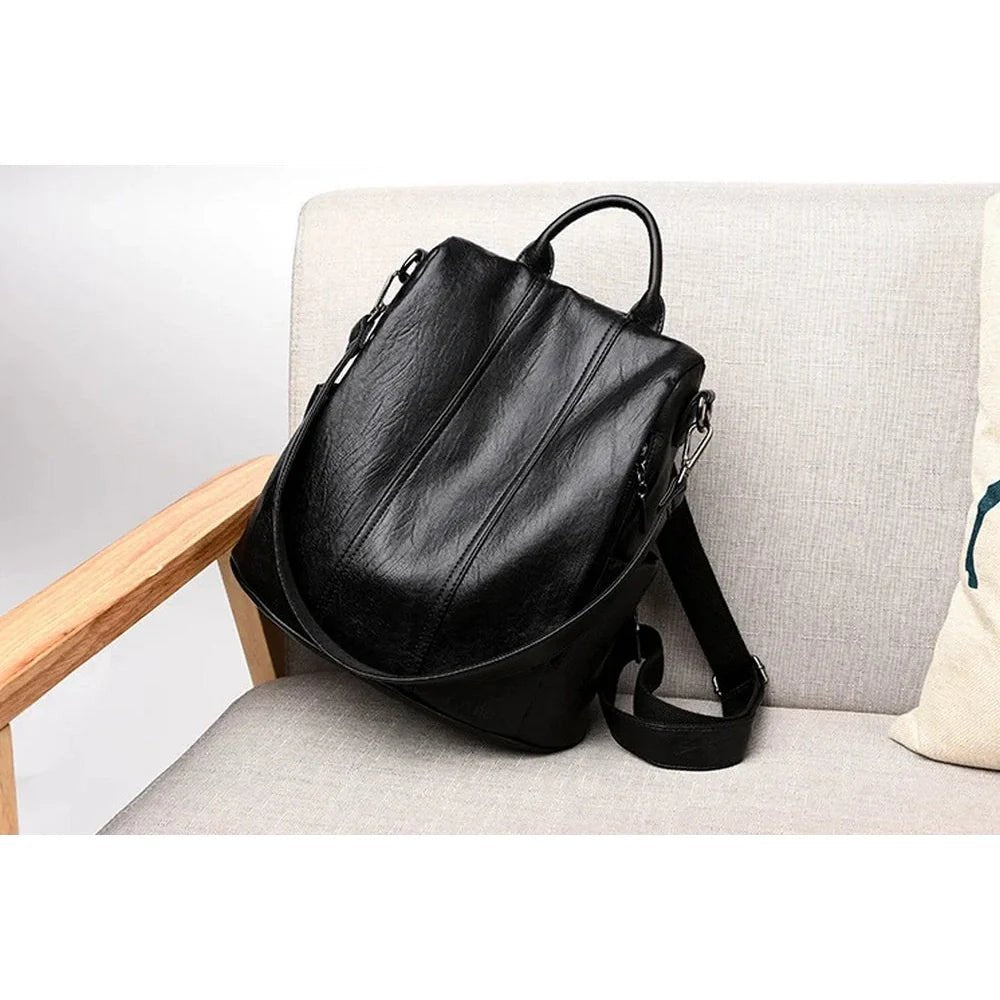 Sac à dos convertible en cuir noir pour femme avec bretelles, style élégant et pratique
