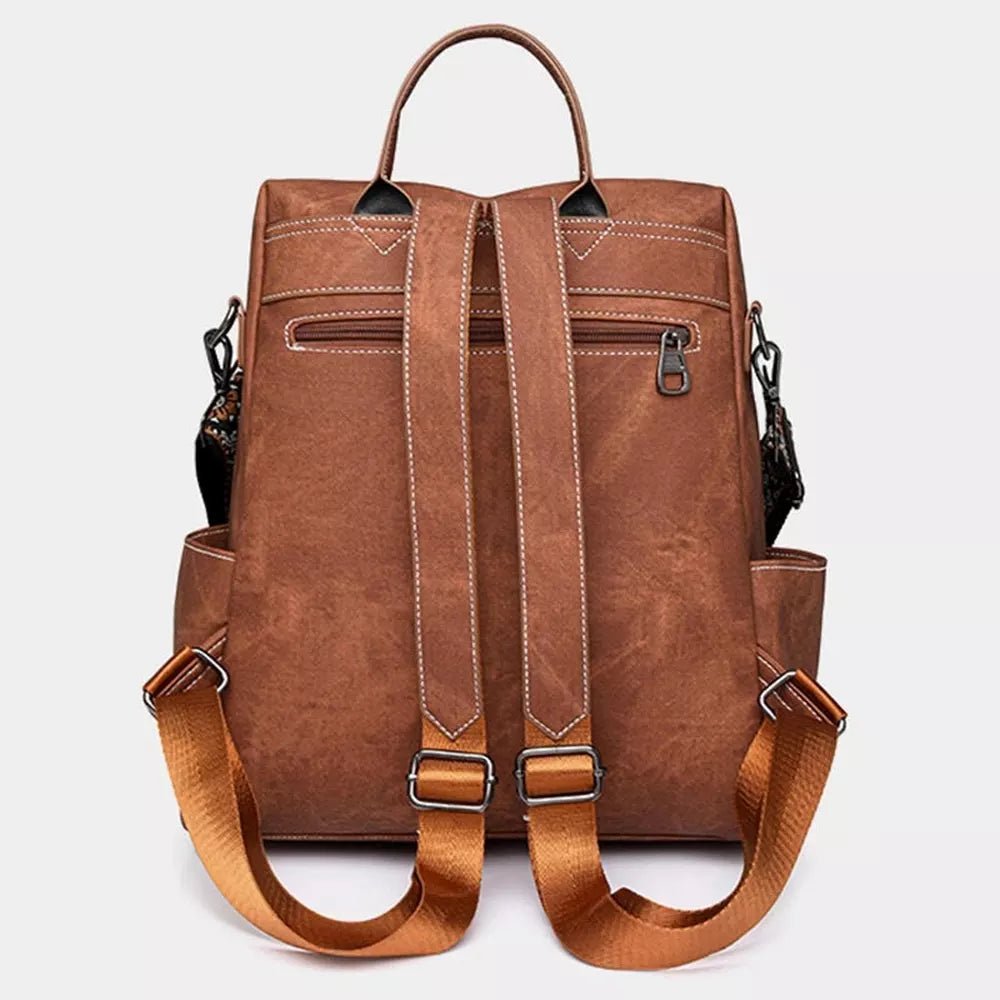 Sac à dos en cuir vintage brun avec bretelles ajustables et multiples poches zippées