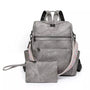 Sac à dos en cuir gris vintage et pochette assortie, look distressed élégant