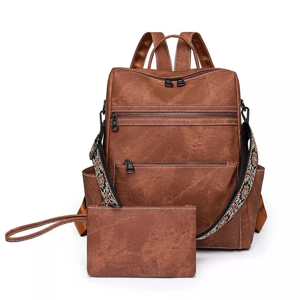 Sac à dos en cuir marron vintage avec plusieurs zips et un porte-monnaie assorti