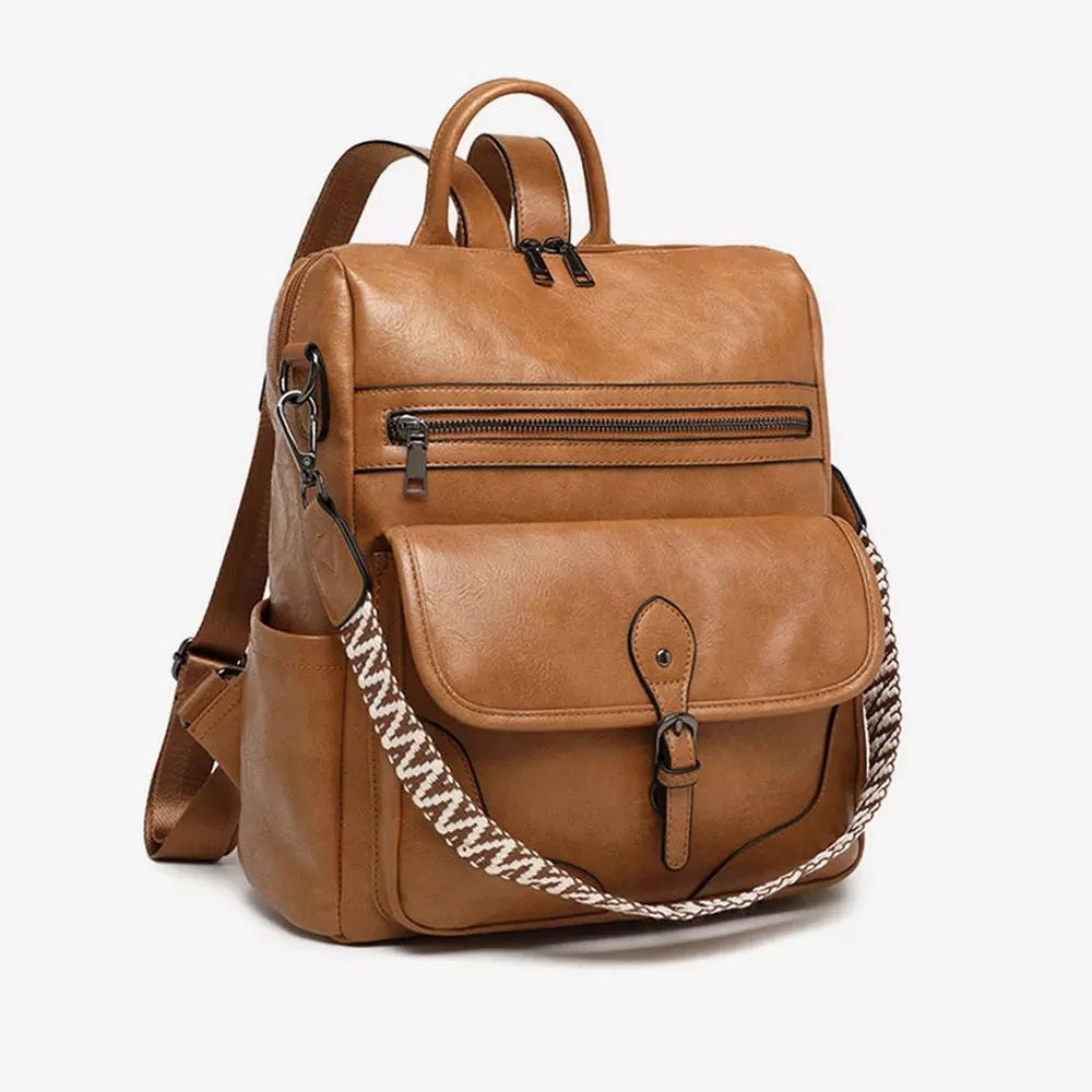 Sac à dos en cuir brun faux avec poches zippées et bandoulière à motif