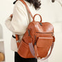 Sac à dos en similicuir pour femme avec bandoulière colorée et charm en tassel