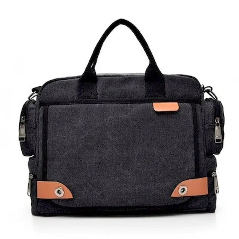 Sac à dos de voyage en toile noire avec accents en cuir marron et multiples compartiments