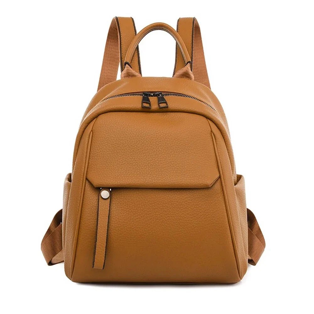 Sac à dos en cuir marron avec bretelles et plusieurs compartiments zippés