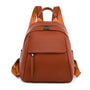 Sac à dos en cuir marron avec poignée, bretelles ajustables, poche avant à rabat
