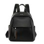 Petit sac à dos en cuir noir avec poignée, bretelles réglables et poches pratiques