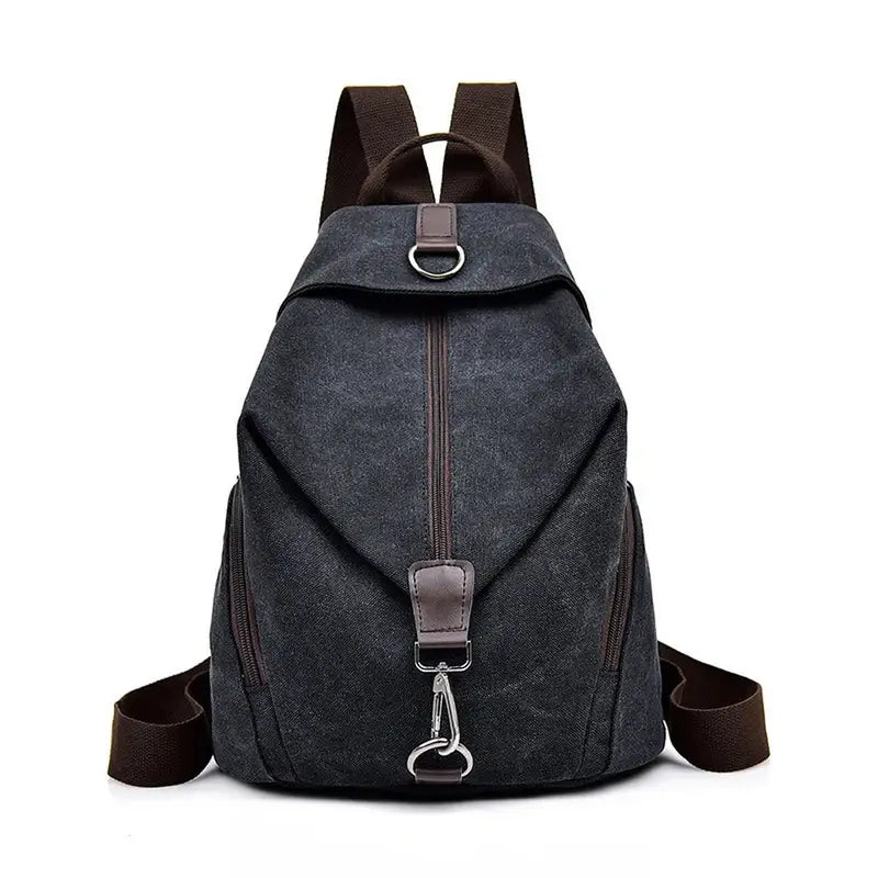 Sac à dos femme de ville en toile gris foncé avec bretelles marron et ferrures argentées