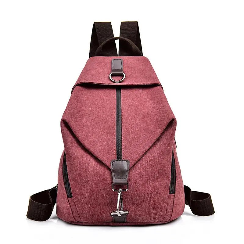 Sac à dos femme de ville en toile rouge avec bretelles marron foncé et ferrures argentées