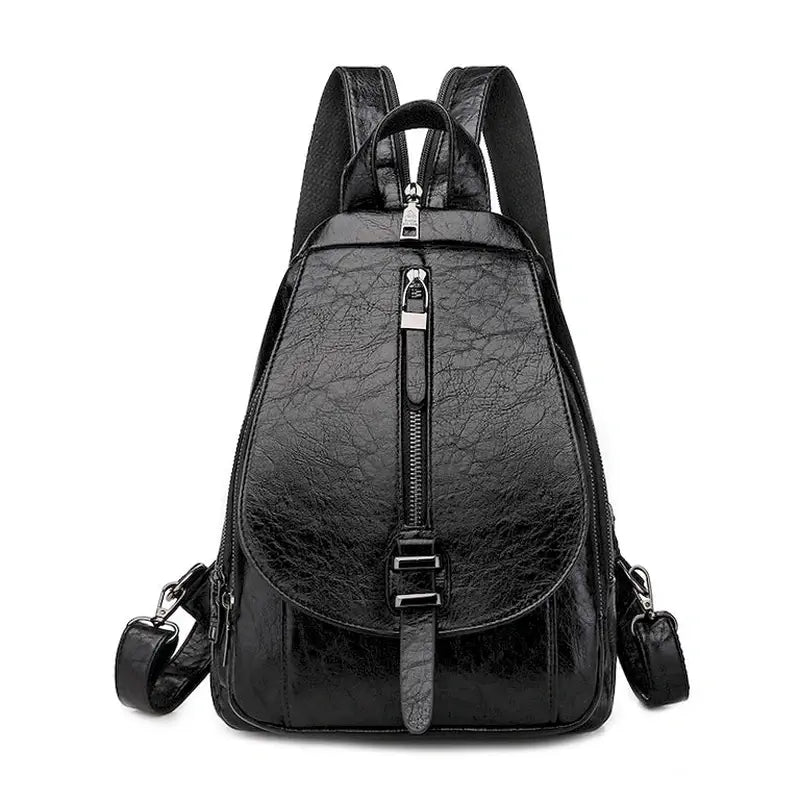 Sac à dos femme en cuir faux noir avec poche zippée et détail boucle