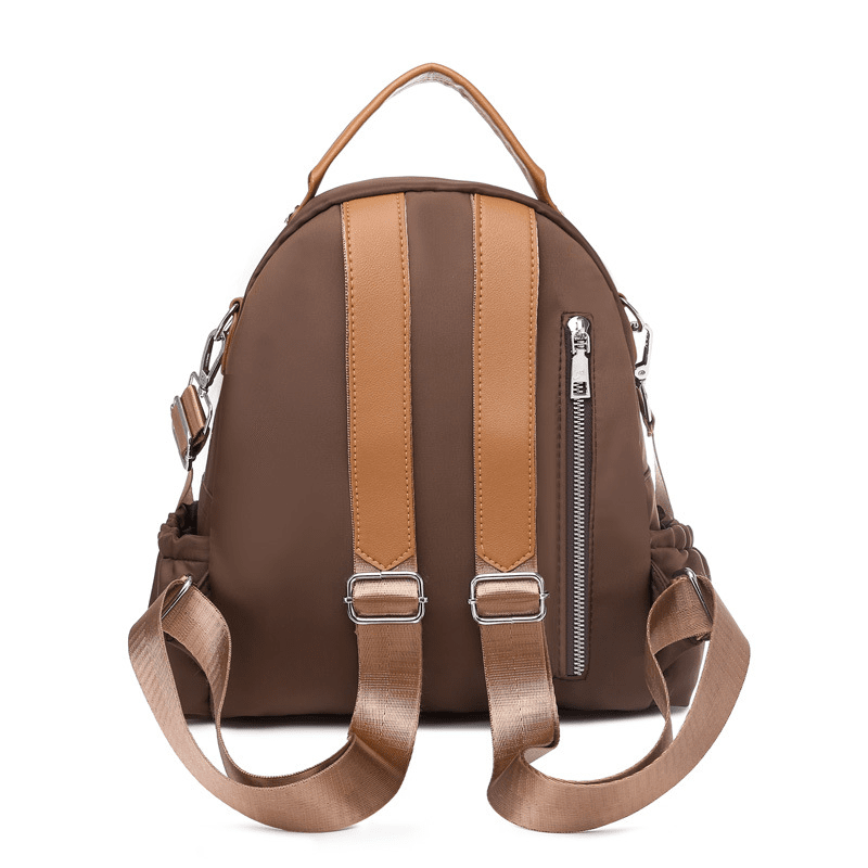 Sac à dos femme fashion marron avec bretelles tan et zips en argent
