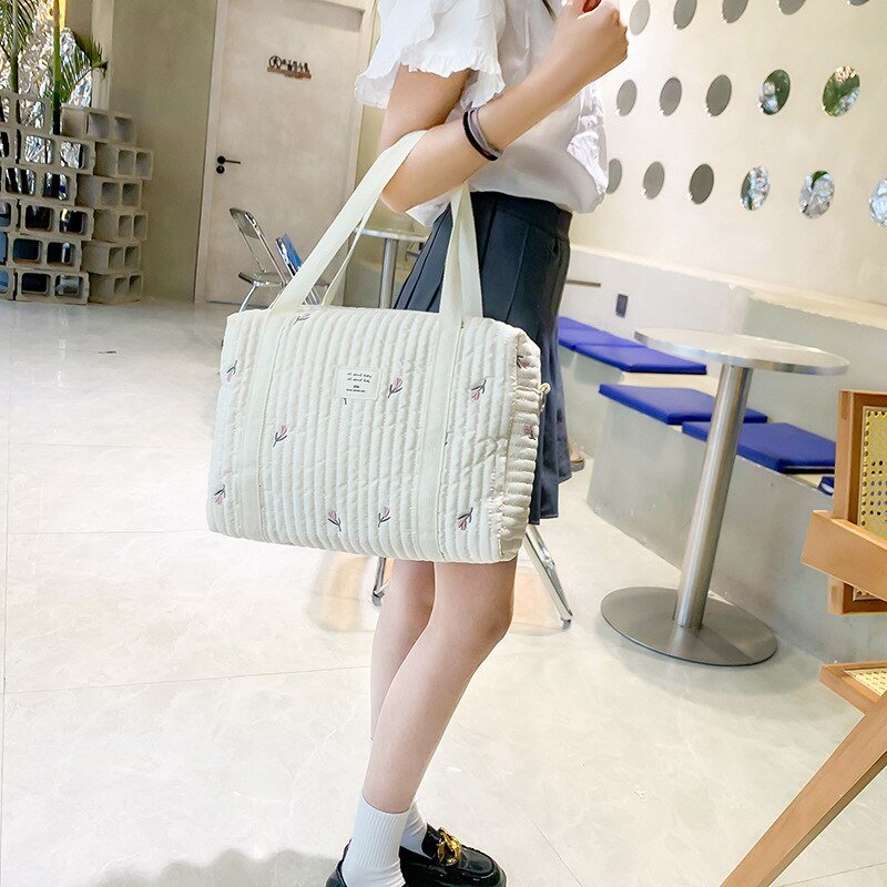 Sac à bandoulière en coton pour bébé avec sac en patchwork blanc cassé et broderies
