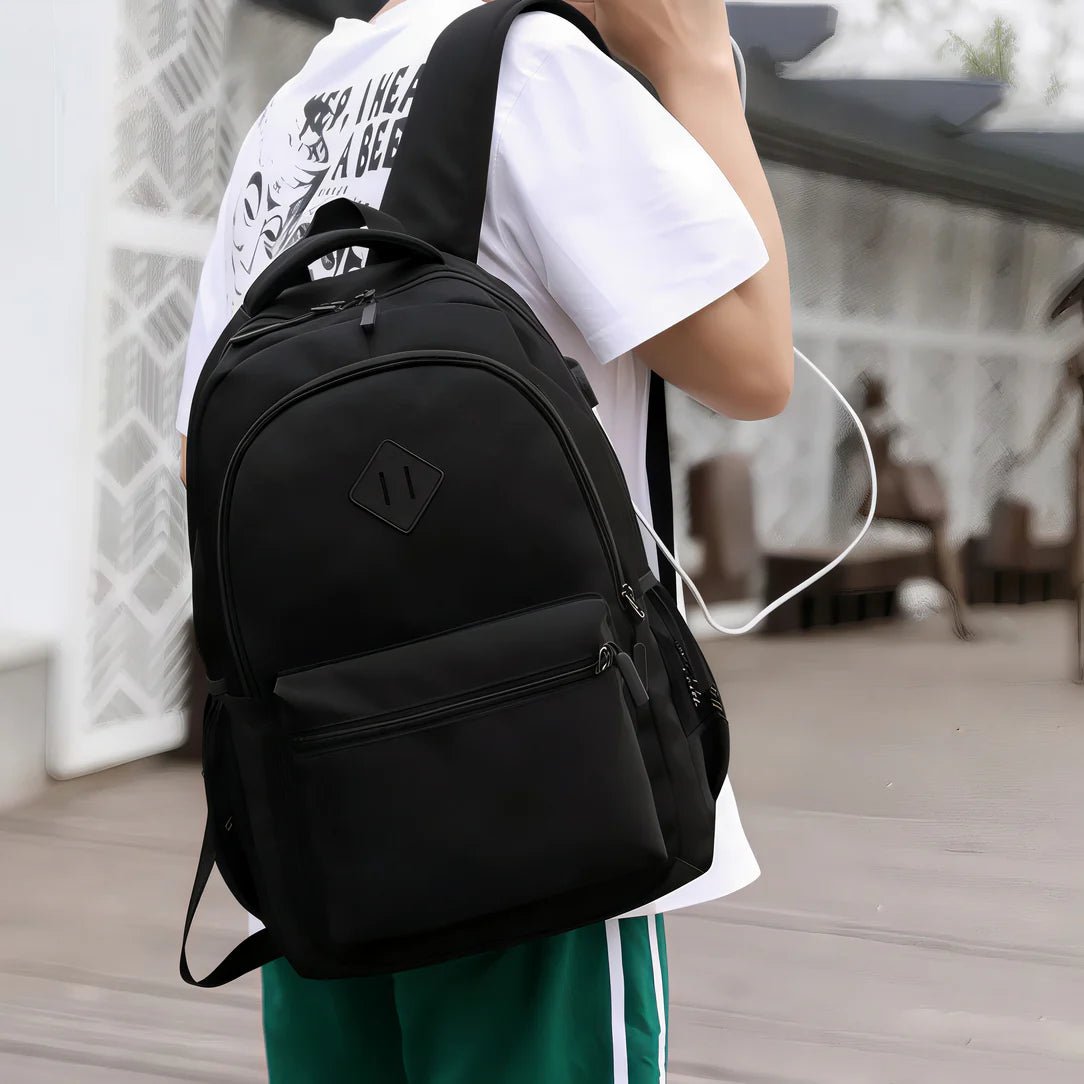 Sac à dos 2 compartiments collège en tissu noir avec poche frontale et patch en diamant