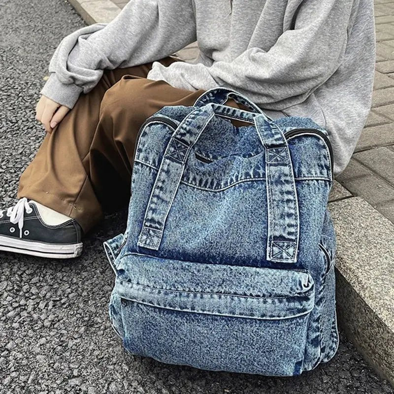 Sac à dos ado fille tendance en denim distressed avec poche frontale élégante