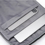 Housse dordinateur grise avec plusieurs compartiments pour ordinateur portable et tablette