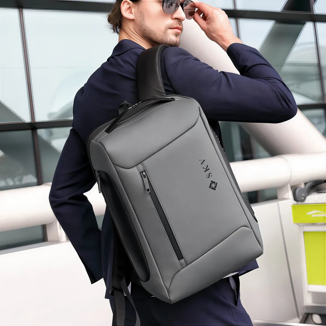Sac à dos antivol SKV SafeGuard gris élégant avec plusieurs compartiments zippés