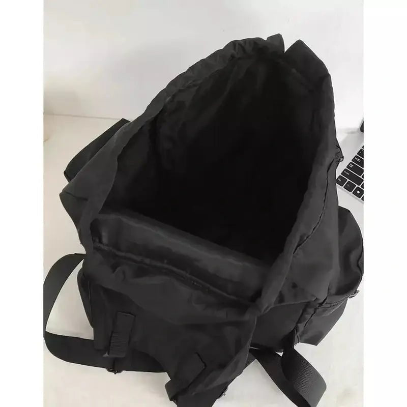Sac à dos baroudeur homme noir ouvert avec poche intérieure pour rangement
