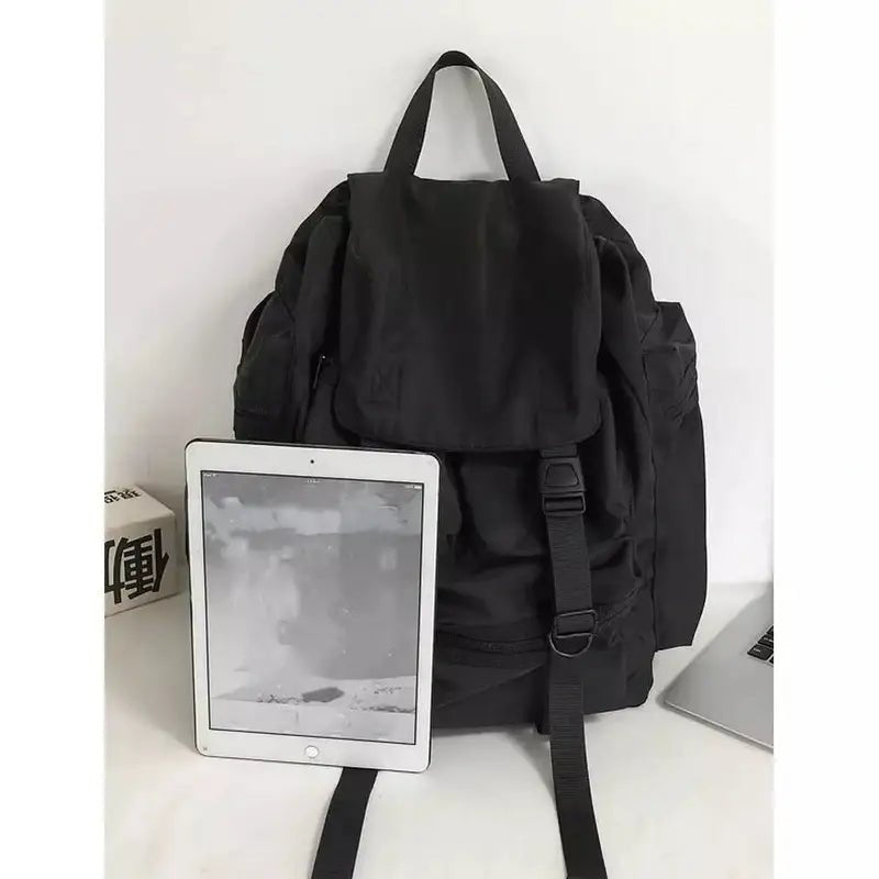 Sac à dos baroudeur homme noir avec cordon, poignée supérieure et boucles