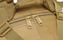 Détail en gros plan du tissu beige avec deux tirettes de la Sac à dos Cityguard 35L