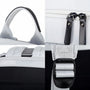Sac à dos collège MoovePack blanc et noir avec poignée, zippers en cuir, dos rembourré