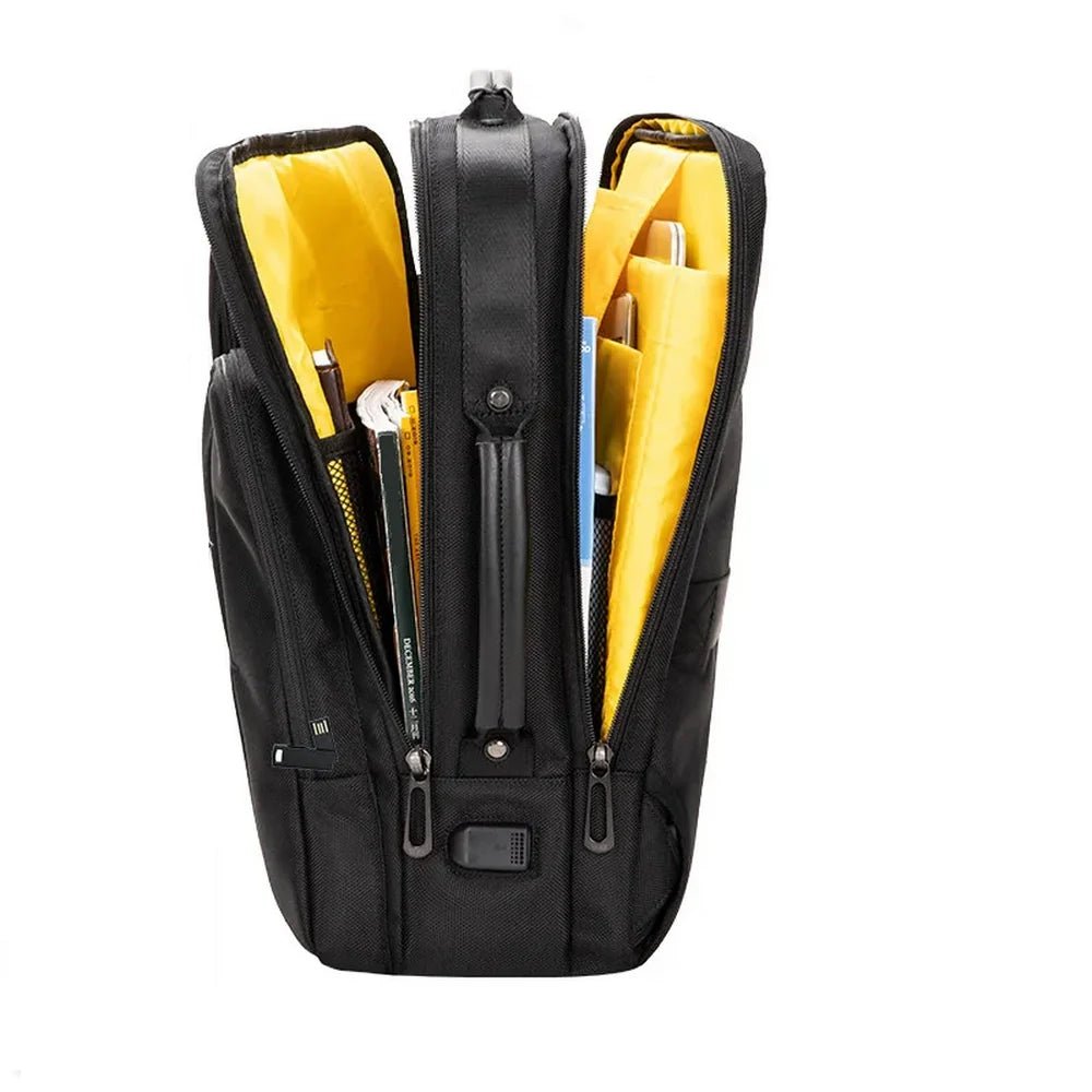 Sac à dos convertible pour ordinateur ouvert avec intérieur jaune et compartiments noirs