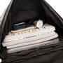 Sac à dos cuir homme décontracté noir avec laptop, livres, montre et accessoires