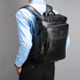 Sac à dos cuir homme noir en cuir avec plusieurs compartiments zippés