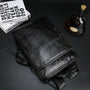 Sac à dos cuir homme en faux cuir noir avec poches zippées et bretelles ajustables