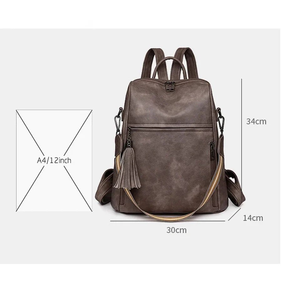 Sac à dos cuir souple en faux cuir marron avec bretelles réglables et charm tassel