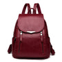 Sac à dos cuir souple en faux cuir marron avec hardware argenté et multiples poches zippées