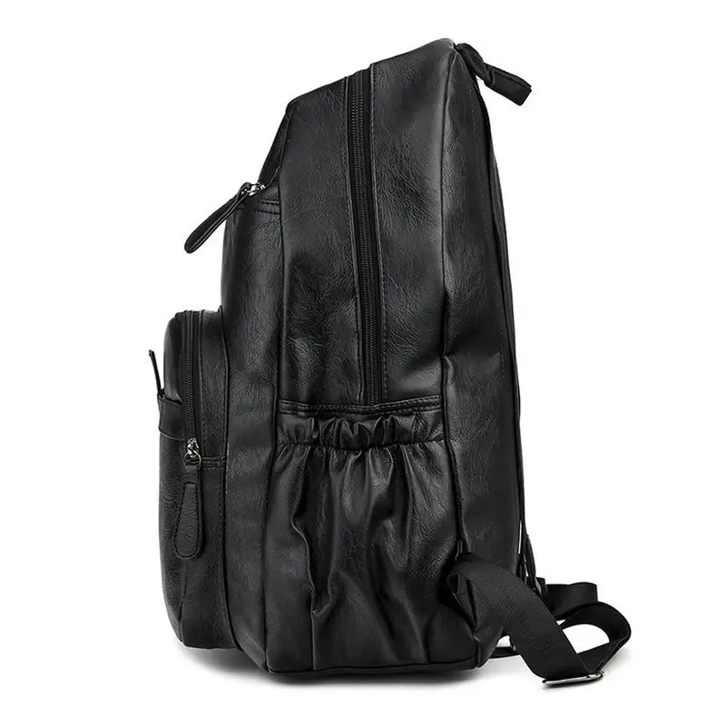 Sac à dos en cuir souple pour femme avec multiples compartiments zippés et poches latérales