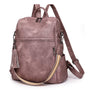 Sac à dos cuir souple en rose poussière convertible en sac à main avec plusieurs compartiments