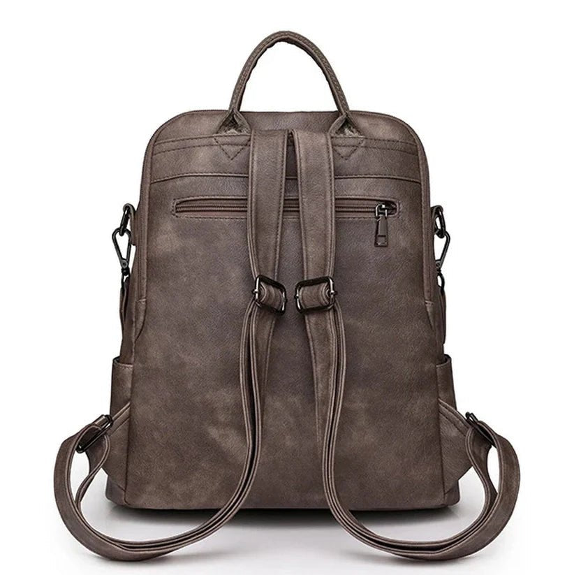 Sac à dos cuir souple en faux cuir gris foncé avec bretelles ajustables et poignée supérieure