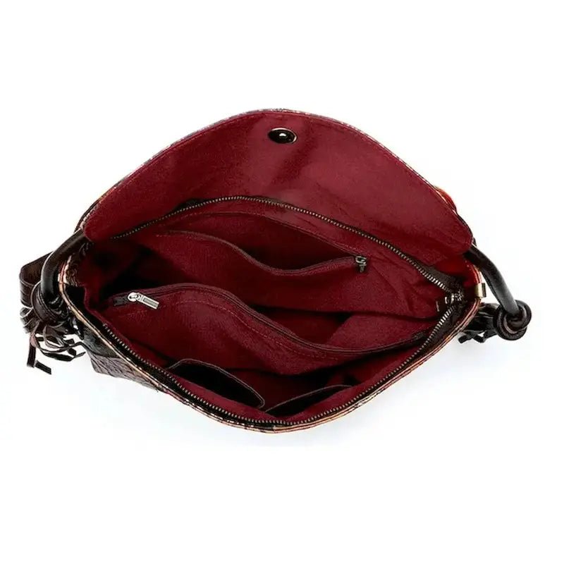 Sac à dos cuir véritable femme avec intérieur rouge foncé, plusieurs poches et fermeture magnétique