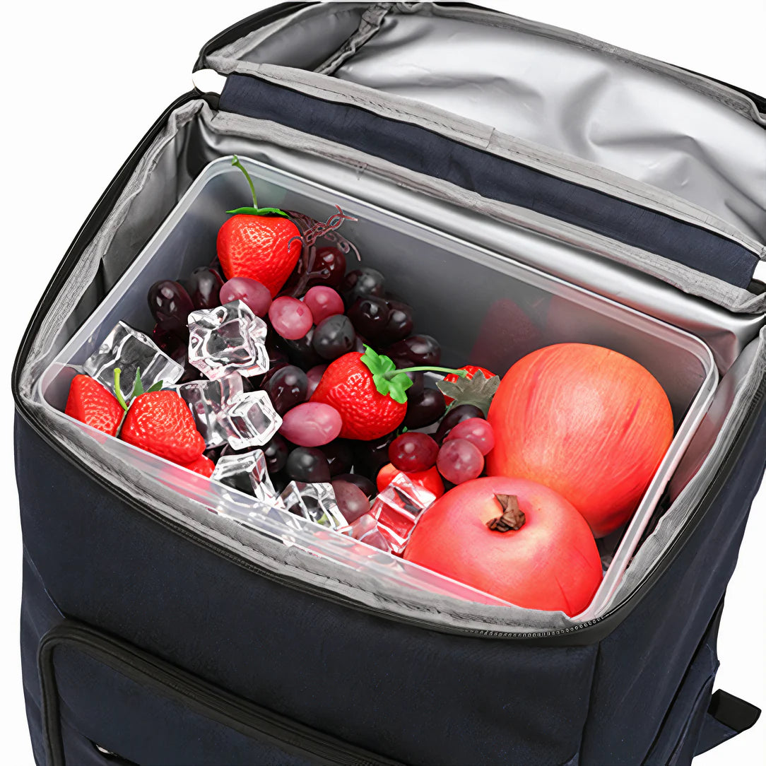 Sac à dos de camping isotherme 24L ouvert avec fruits et glaçons dans un conteneur