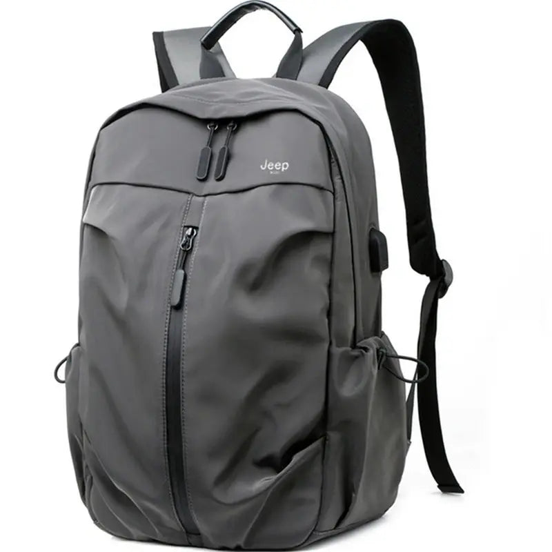 Sac à dos de cours moderne gris foncé avec plusieurs compartiments zippés et port USB latéral