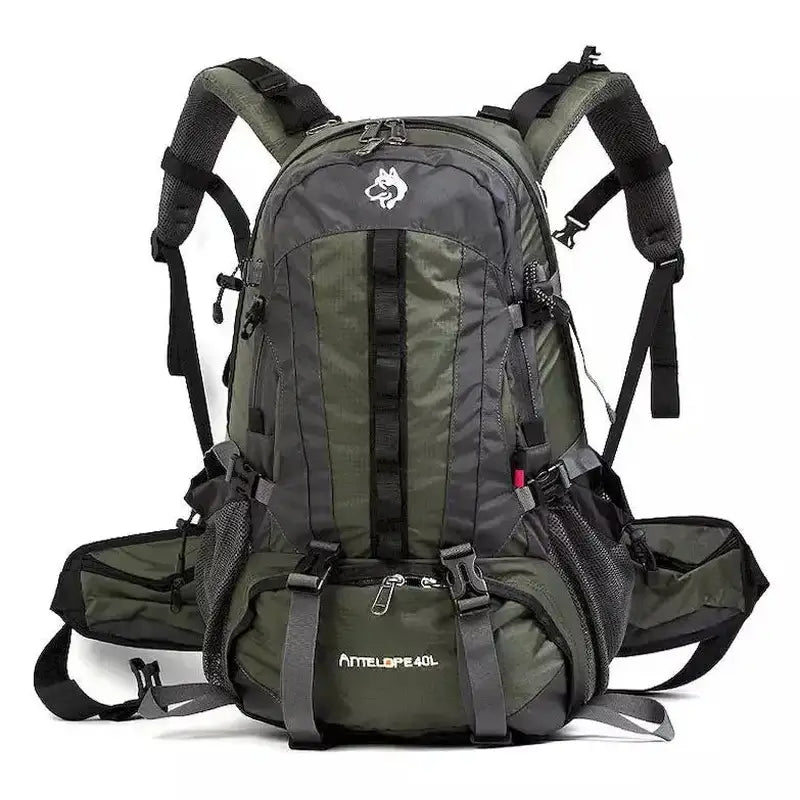 Sac à dos de randonnée 40L vert foncé et gris avec multiples compartiments et bretelles ajustables