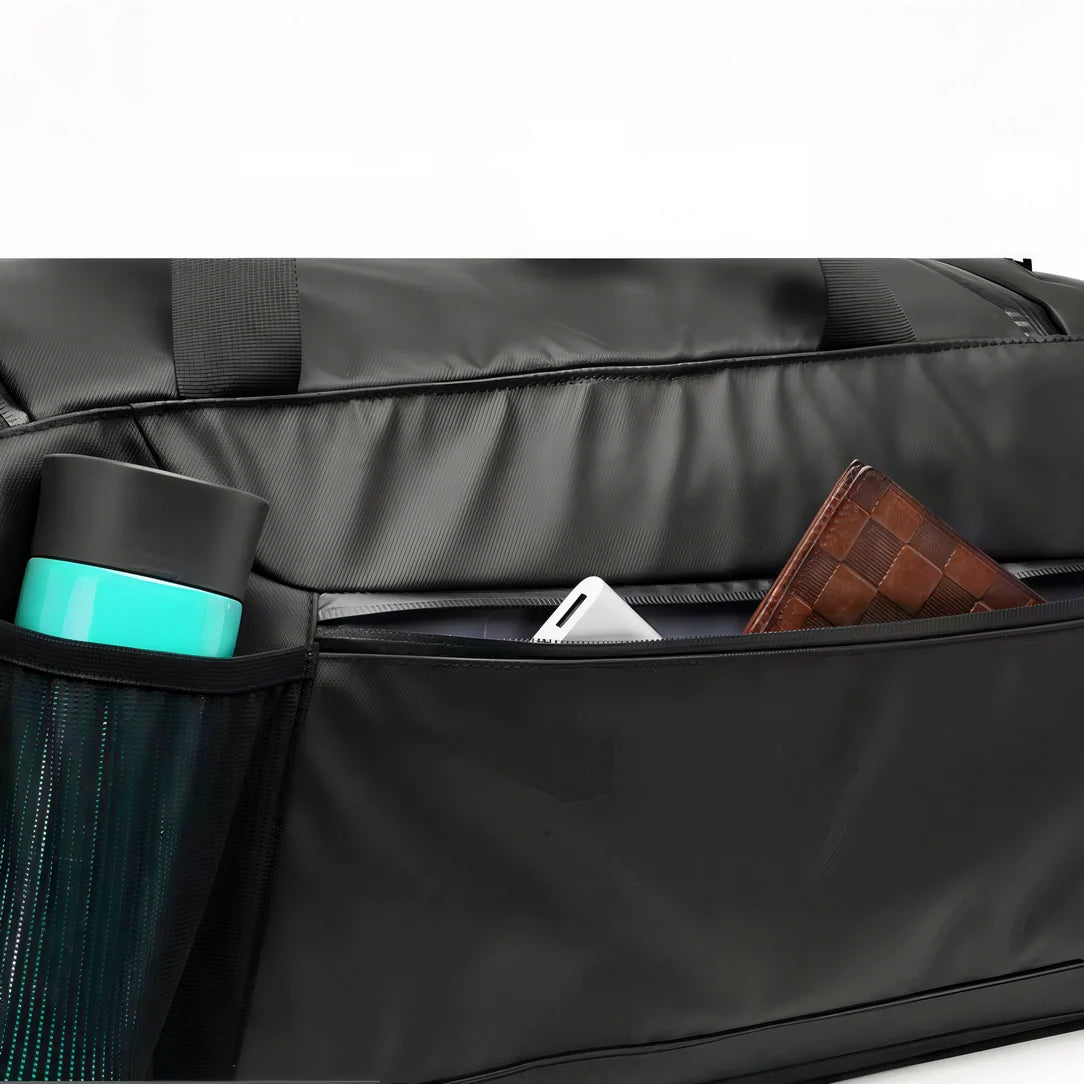 Sac à dos de sport noir avec poches maillées et porte-bouteille