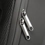 Zoom sur les tirettes en métal du Sac à dos de ville antivol CityGuard