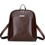 Sac à dos de ville femme cuir en cuir brun foncé brillant avec poche frontale et hardware argenté