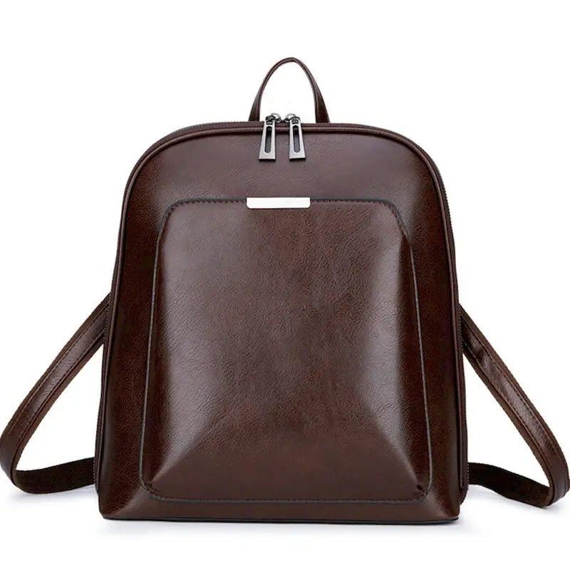 Sac à dos de ville femme cuir en cuir brun foncé brillant avec poche frontale et hardware argenté