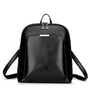 Sac à dos de ville femme cuir noir faux avec hardware argenté pour femme élégante