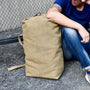 Sac à dos de voyage 40L en toile cirée beige avec anse roulée et sangle réglable