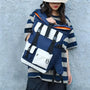 Sac à dos de voyage vintage en toile bleu marine et blanc avec poches et boucles
