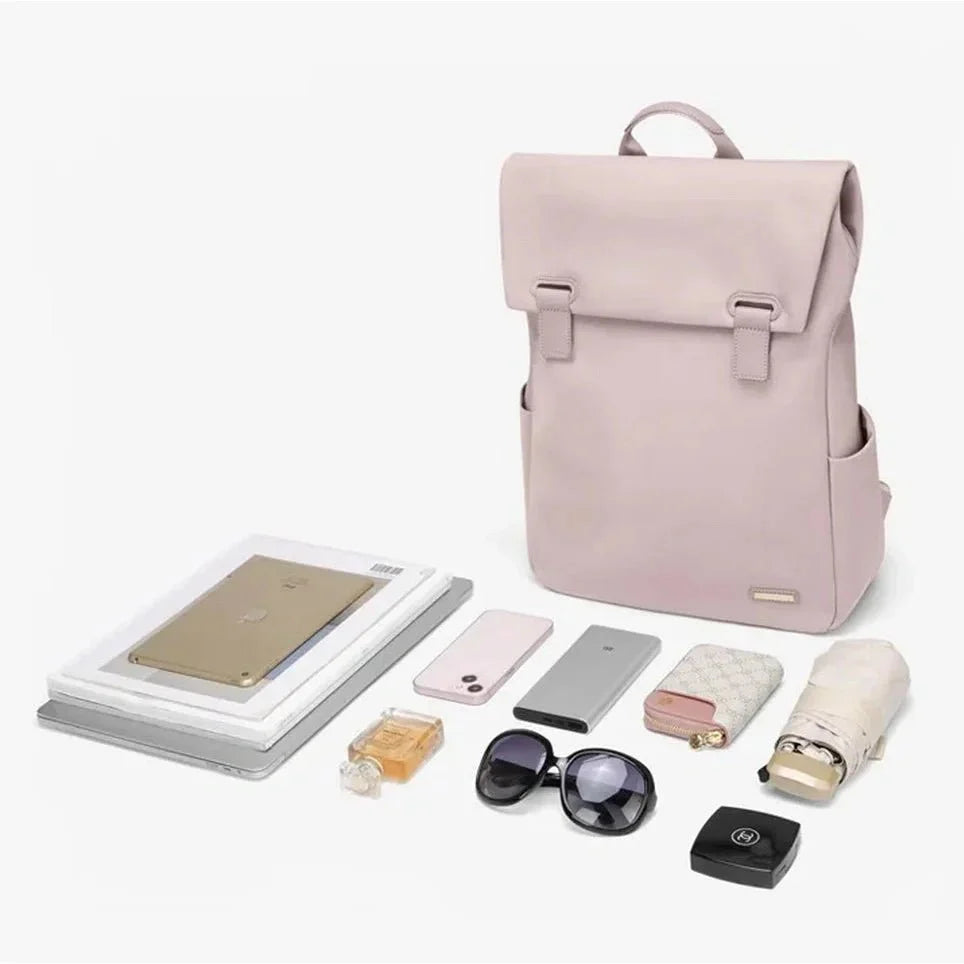 Sac à dos déperlant femme rose clair avec rabat, boucles et poches latérales