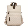 Sac à dos effet matelassé beige avec accents en cuir marron et bretelles ajustables