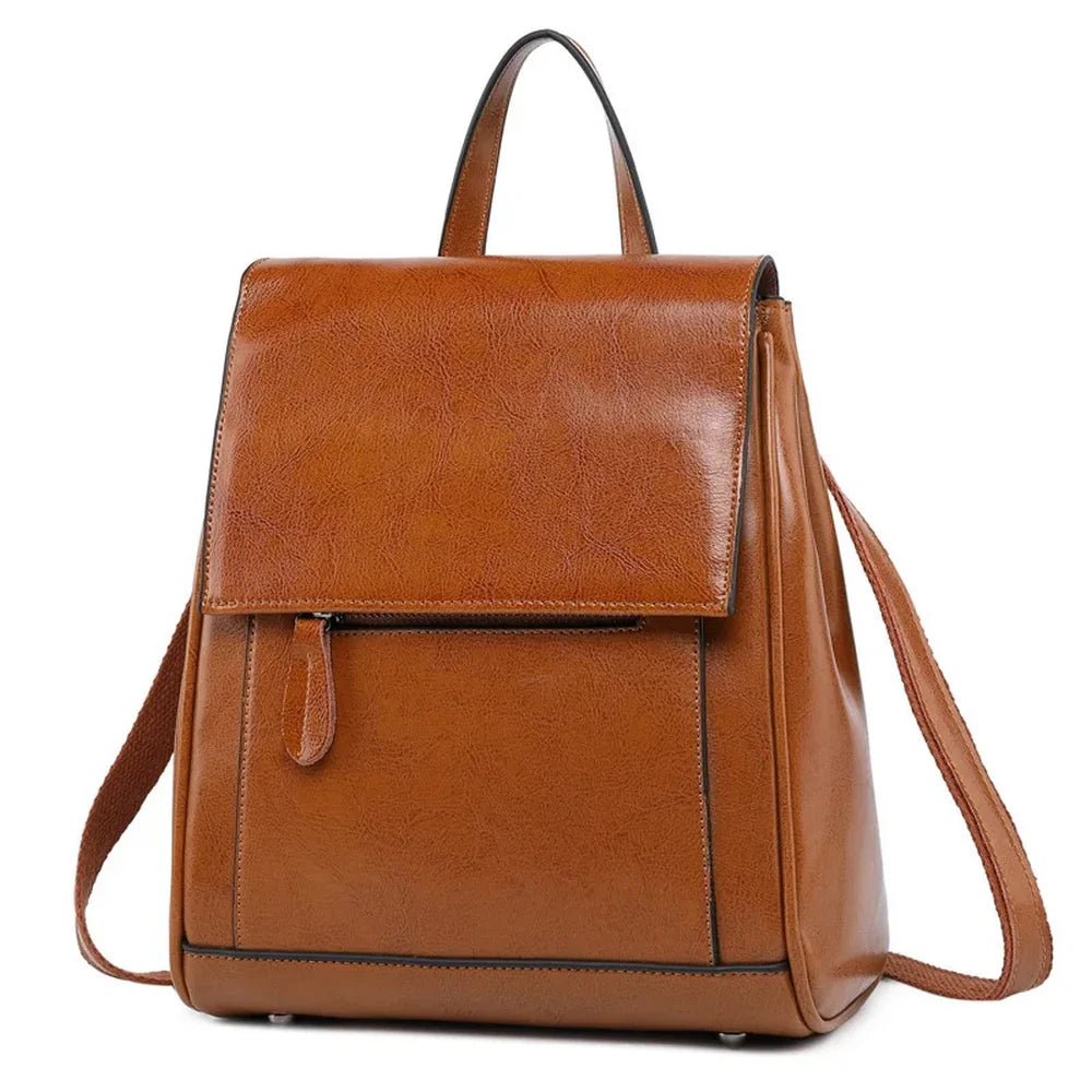 Sac à dos en cuir de vachette brun avec rabat et poche zippée verticale